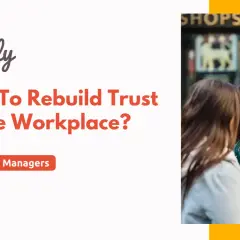 Two women converse, illustrating how to rebuild trust in the workplace.