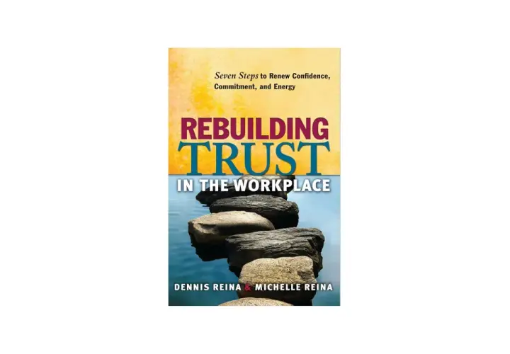 Book cover: "Rebuilding Trust in the Workplace" by Dennis & Michelle Reina. Stacked stones symbolize rebuilding trust.