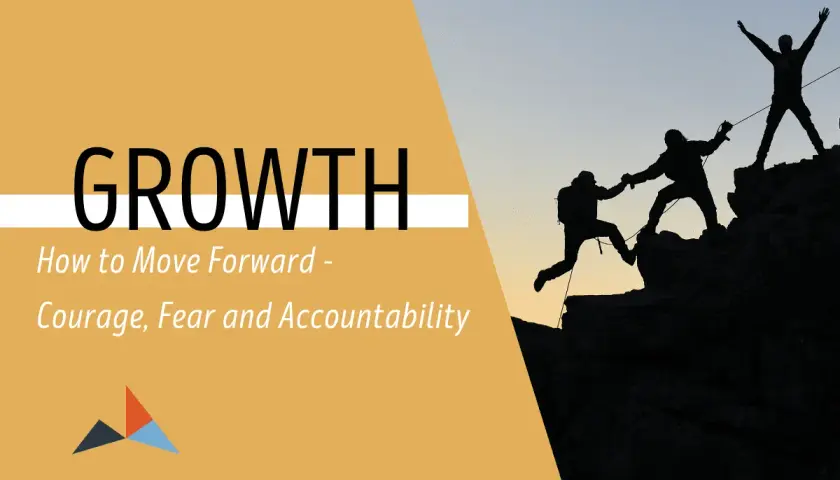 Climbers help each other up a rocky peak, symbolizing how courage and accountability, though sometimes feeling like an attack, are vital for growth and moving forward.