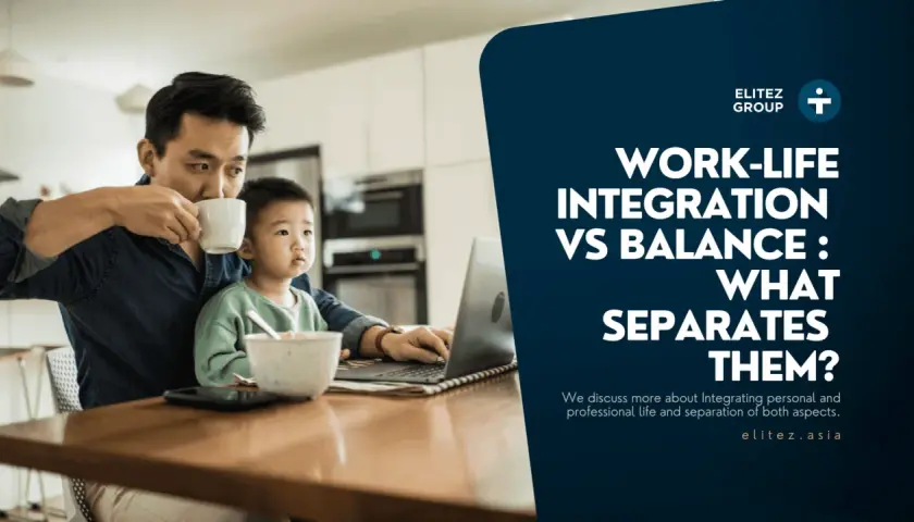 A father drinks coffee while his child sits on his lap, both looking at a laptop. The image explores work-life integration vs balance.