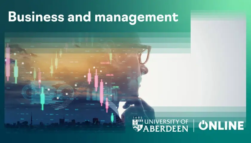 Man in glasses looking at stock market data. Earn your accredited online business administration degree with the University of Aberdeen.
