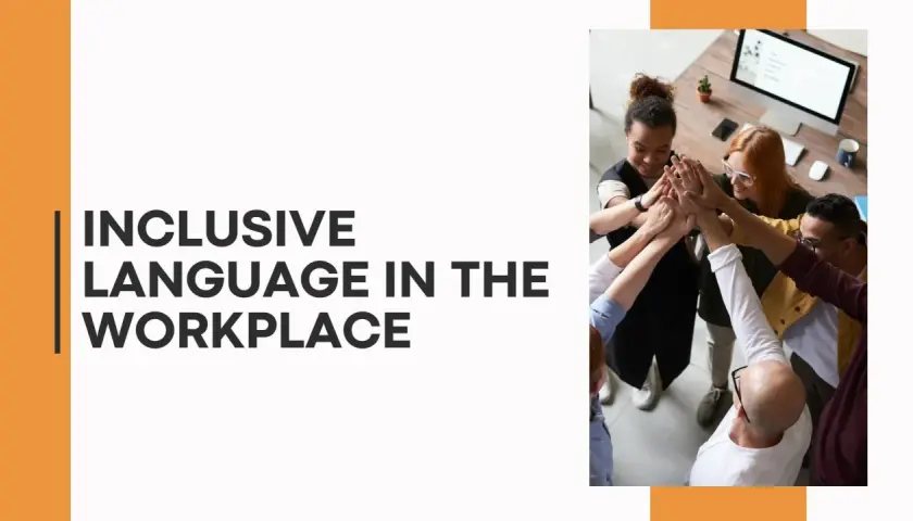 A diverse team high-fives, symbolizing unity and the importance of inclusive language in the workplace.