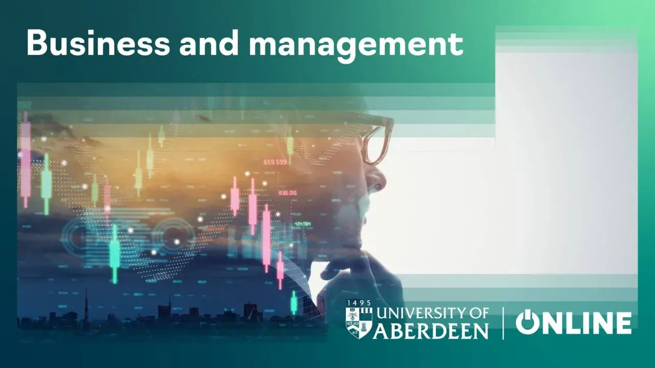 Man in glasses looking at stock market data. Earn your accredited online business administration degree with the University of Aberdeen.