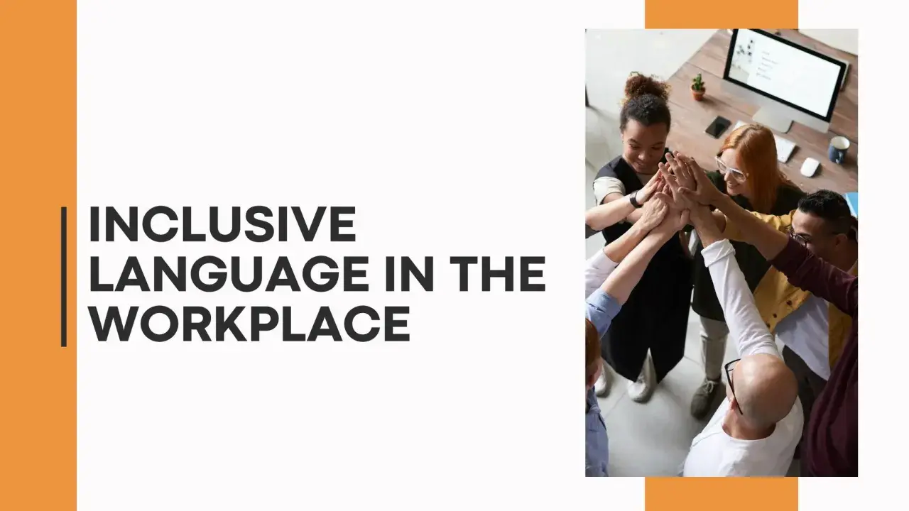 A diverse team high-fives, symbolizing unity and the importance of inclusive language in the workplace.