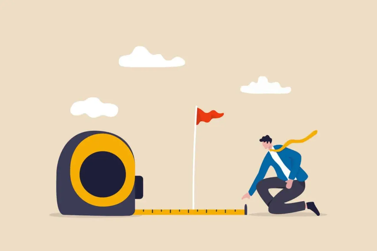 A man measures the distance to a goal flag, symbolizing progress and planning at an internal communications conference.