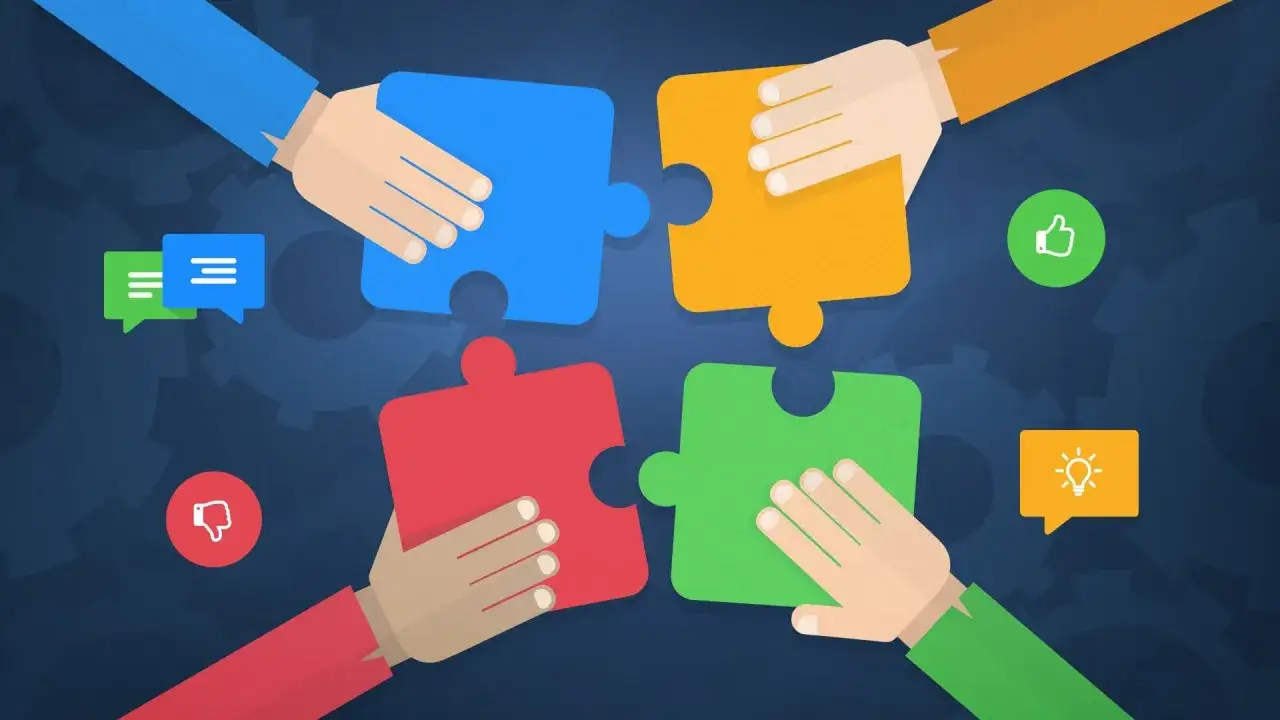 Four hands connect puzzle pieces, symbolizing how accountability is important in a team for successful collaboration and achieving goals.